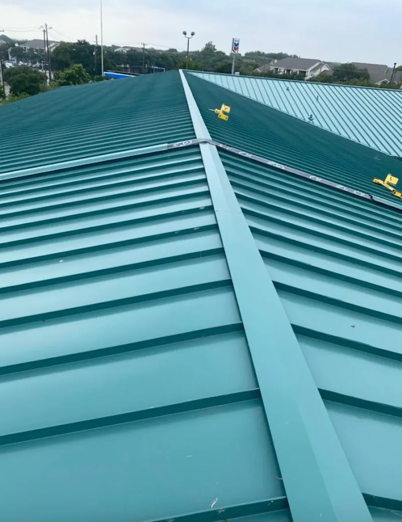 Green commercial metal roof ridge and valley for Metal Roof Repair in Ansonia